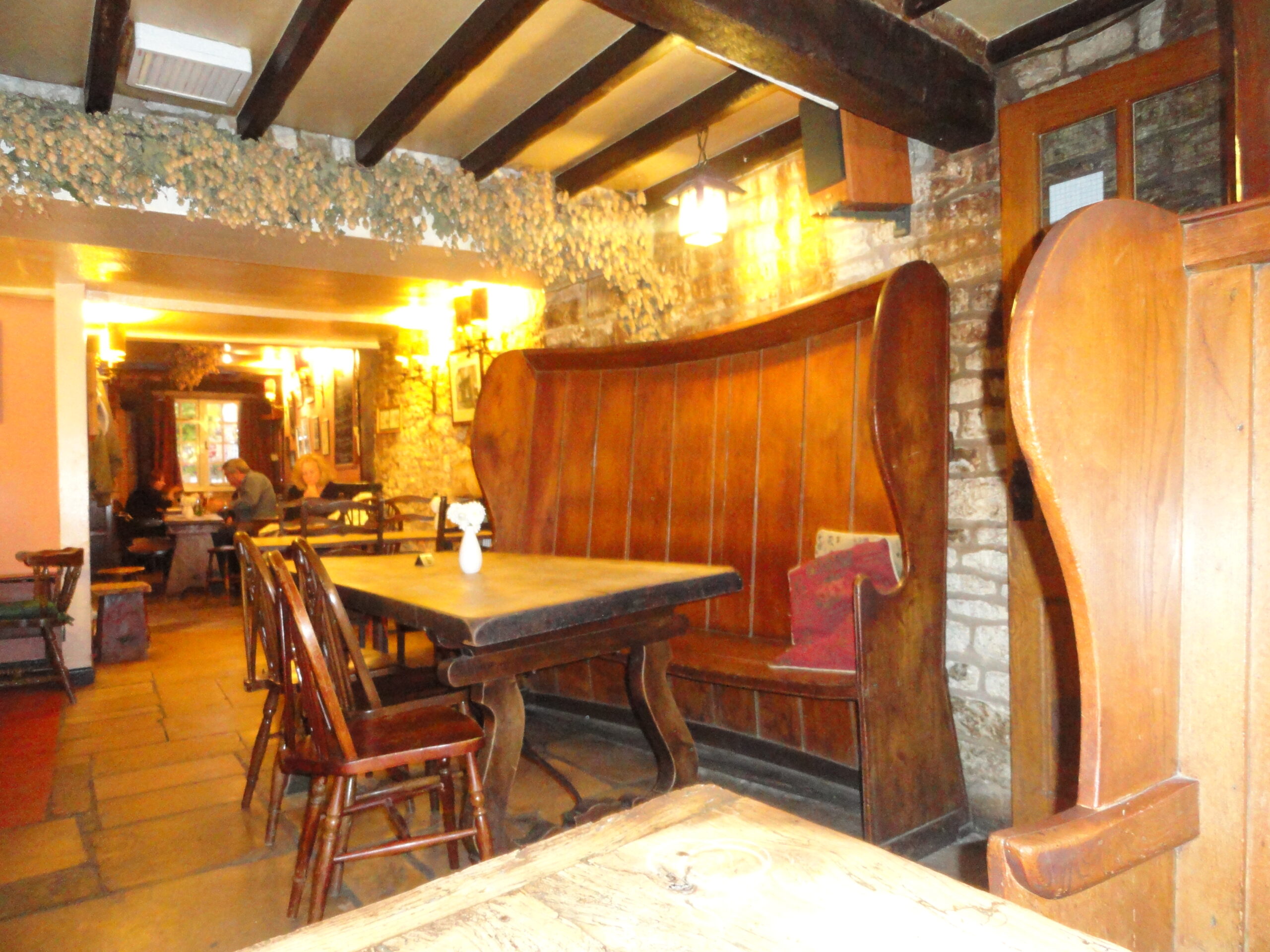Cosy Cotswolds pub interior log fire