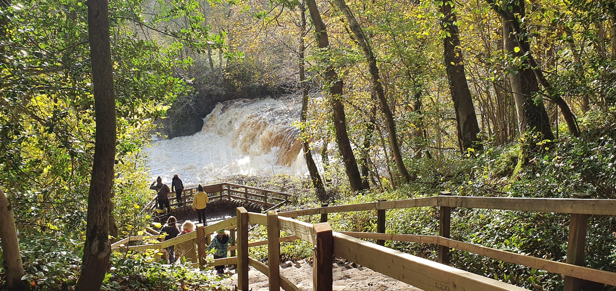 Waterfall cascade mist spray limestone steps power