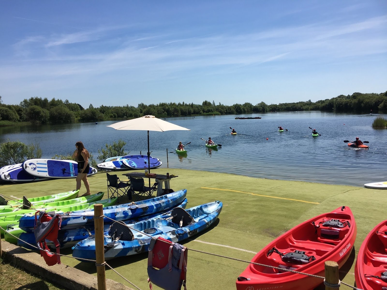Kayaking paddling tranquil lake water