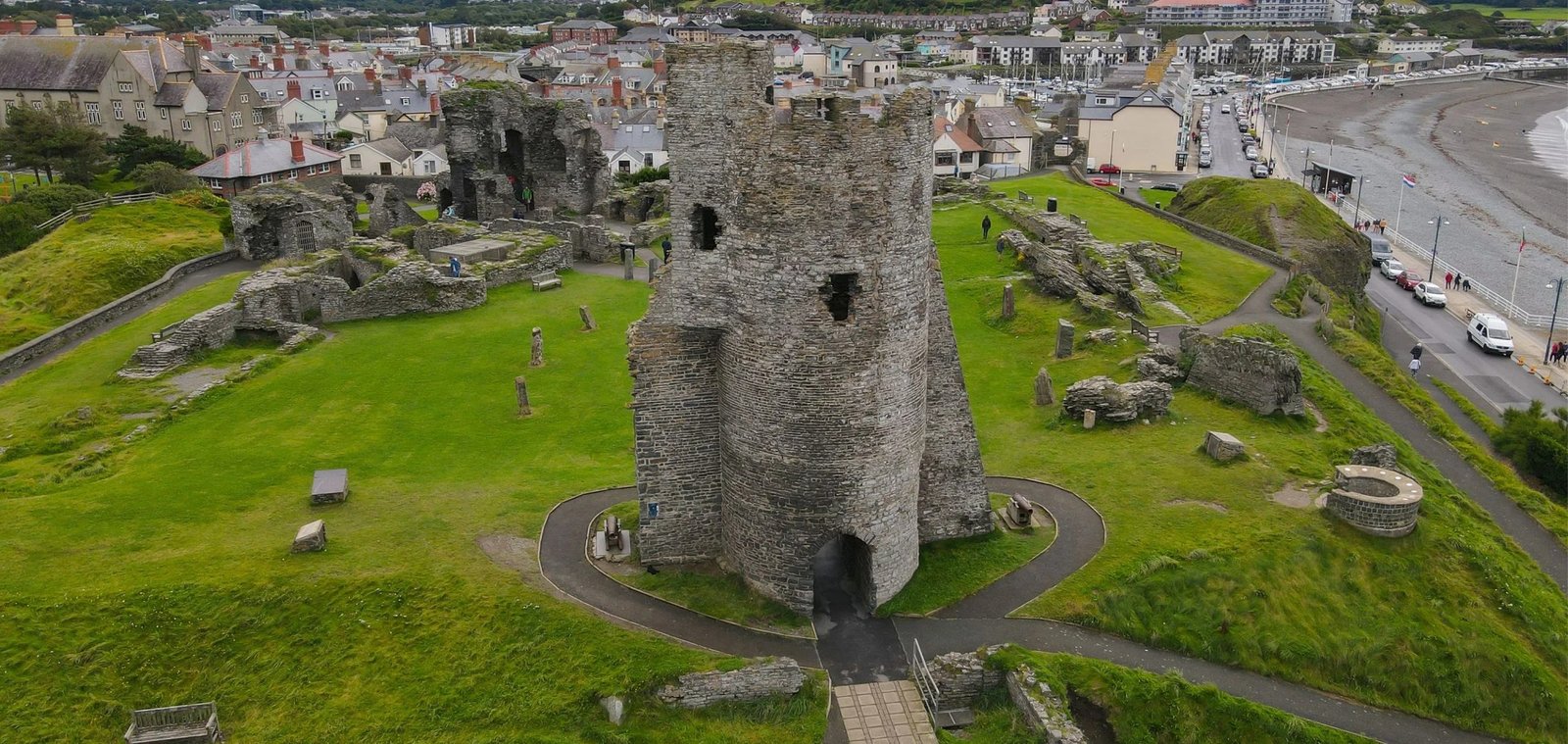 The medieval ruins of Aberystwyth Castle beside the sea