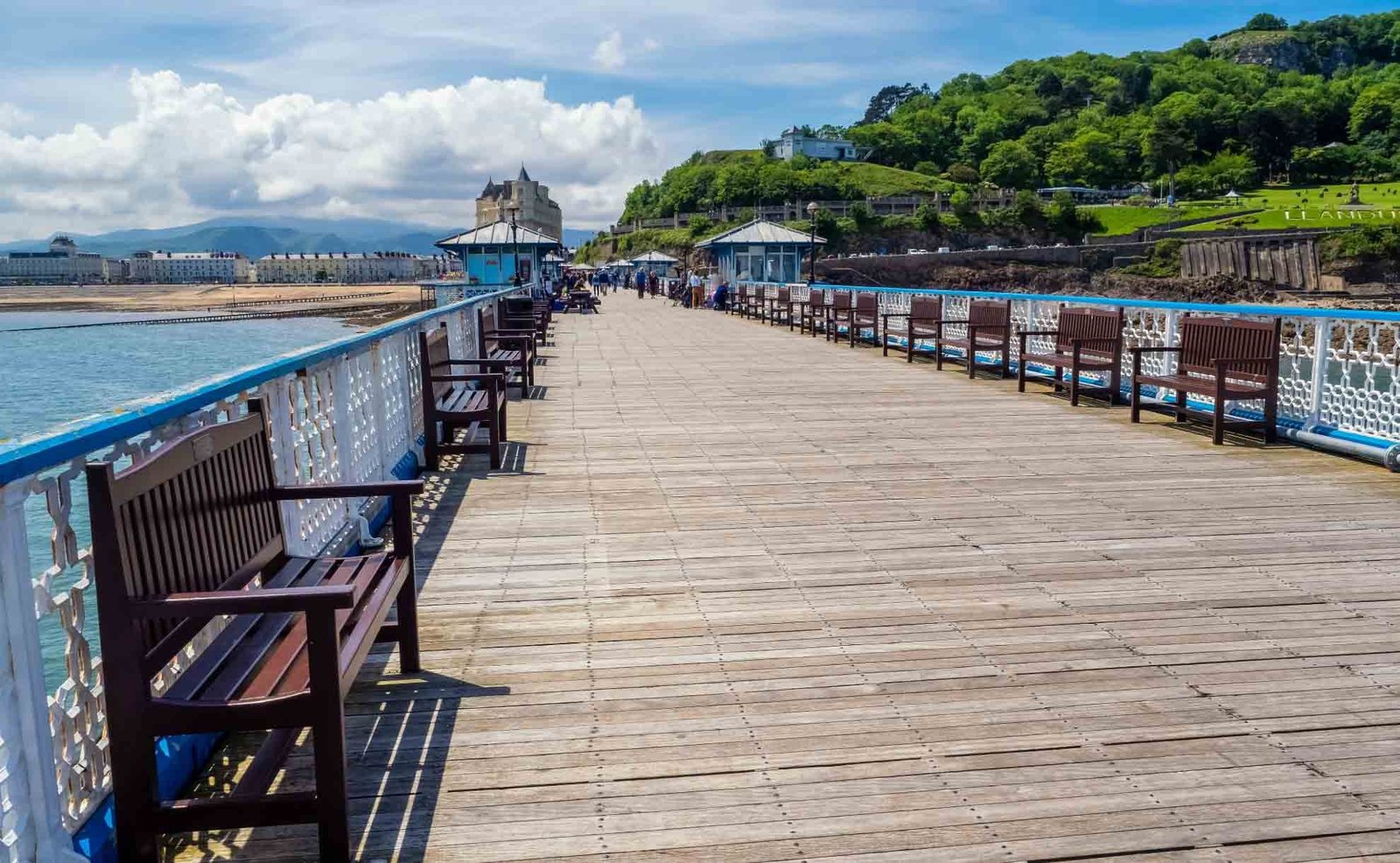 Visitors enjoying a walk along Llandudno Pier