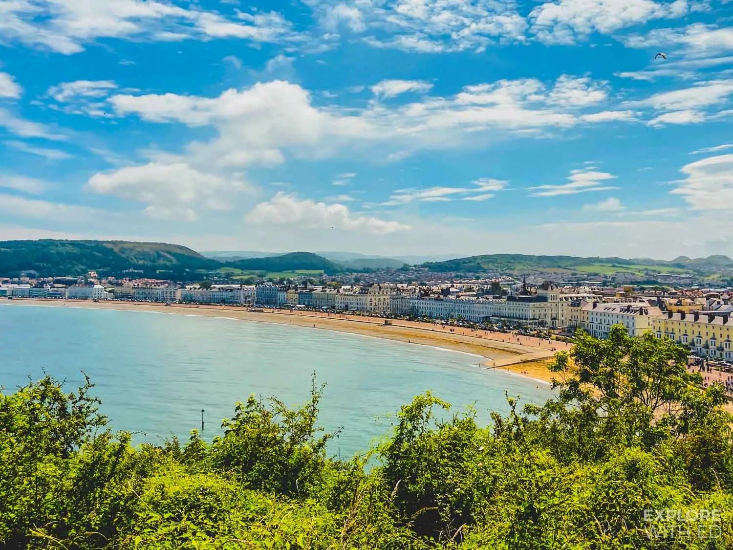 Families enjoying Llandudno Promenade and North Shore