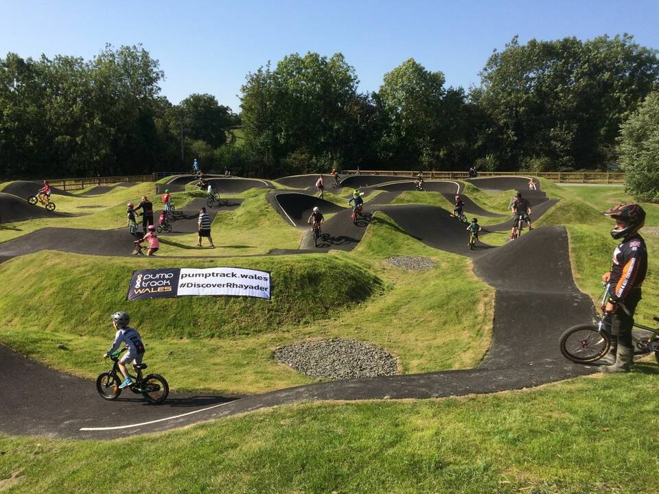 Young riders enjoying Pump Track Wales in Rhayader